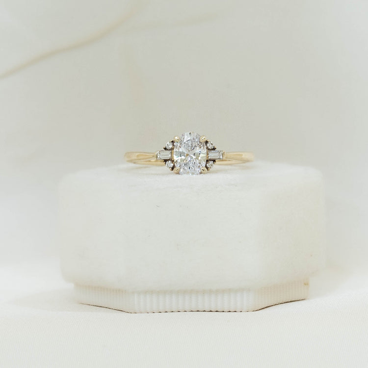 14ky Low Profile Oval with Baguette & Round Accents Diamond Ring