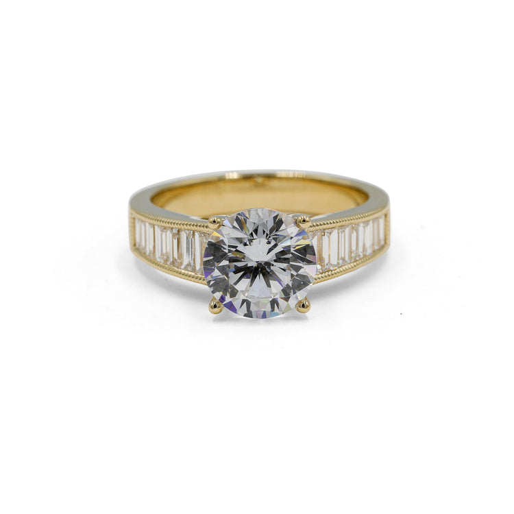 14ky .69ctw Round & Graduated Baguette Diamond Ring