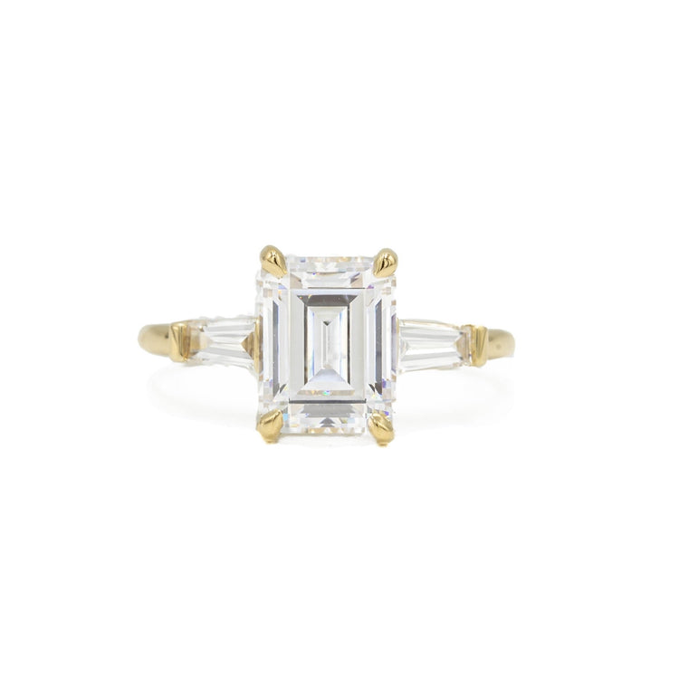 14ky .32ctw 3-Stone Emerald & Tapered .32ctw Baguette Diamond Ring