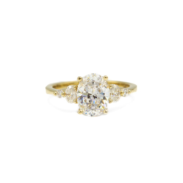 14ky .33ctw Oval with Oval & Round 5-Stone Diamond Ring