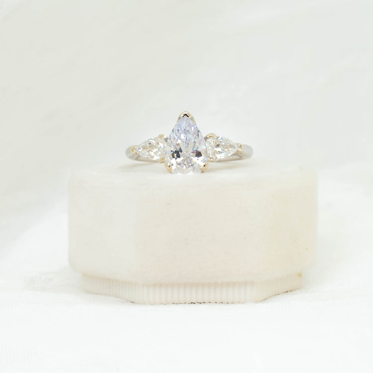 18kw .64ctw 3-Stone Pear Shaped Butter-Cut Diamond Ring