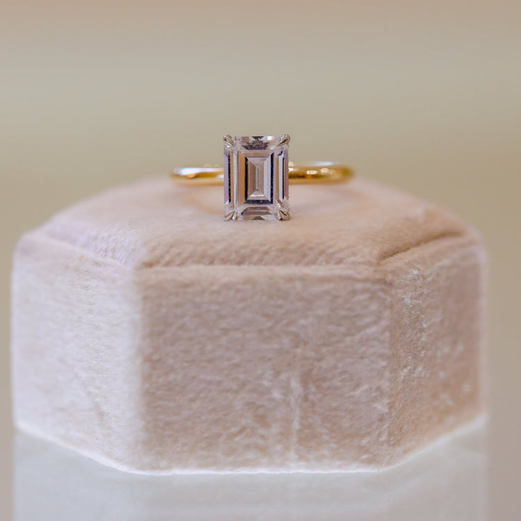 14ky .07ctw Emerald-Cut Solitaire w/ Platinum Hidden Halo Diamond Ring