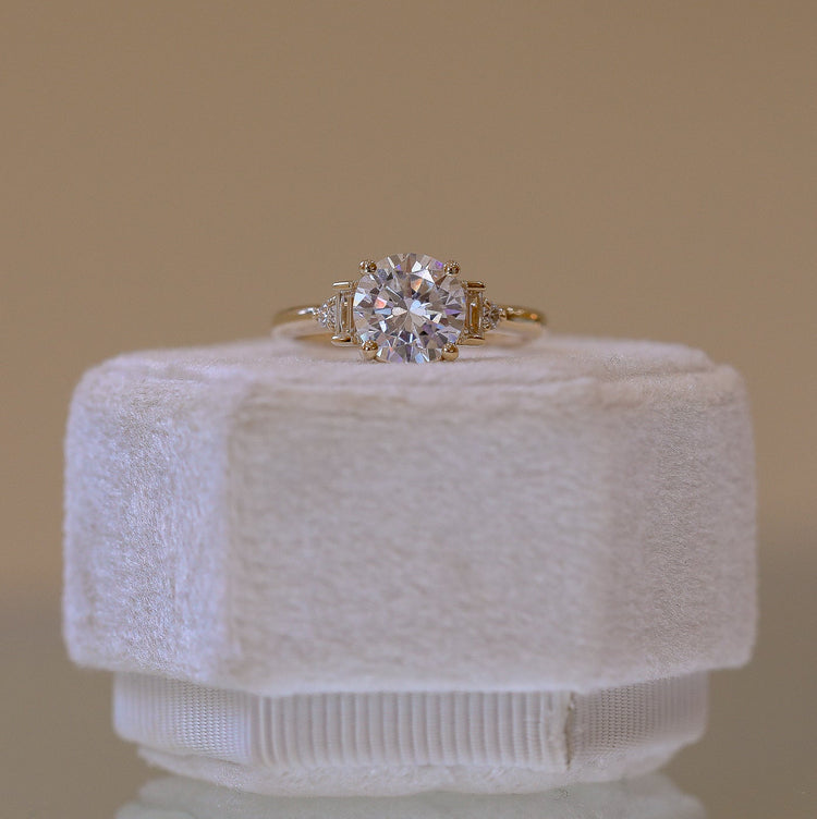 14ky Round & Baguette 5-Stone Cathedral Diamond Ring