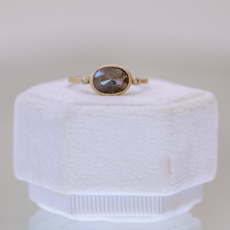 18ky 1.34ct Oval East-West Bezel with Accents Diamond Ring