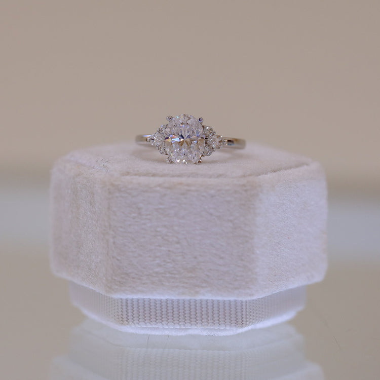 14kw Oval with .19ctw Pear and .11ctw Round Accent Ring