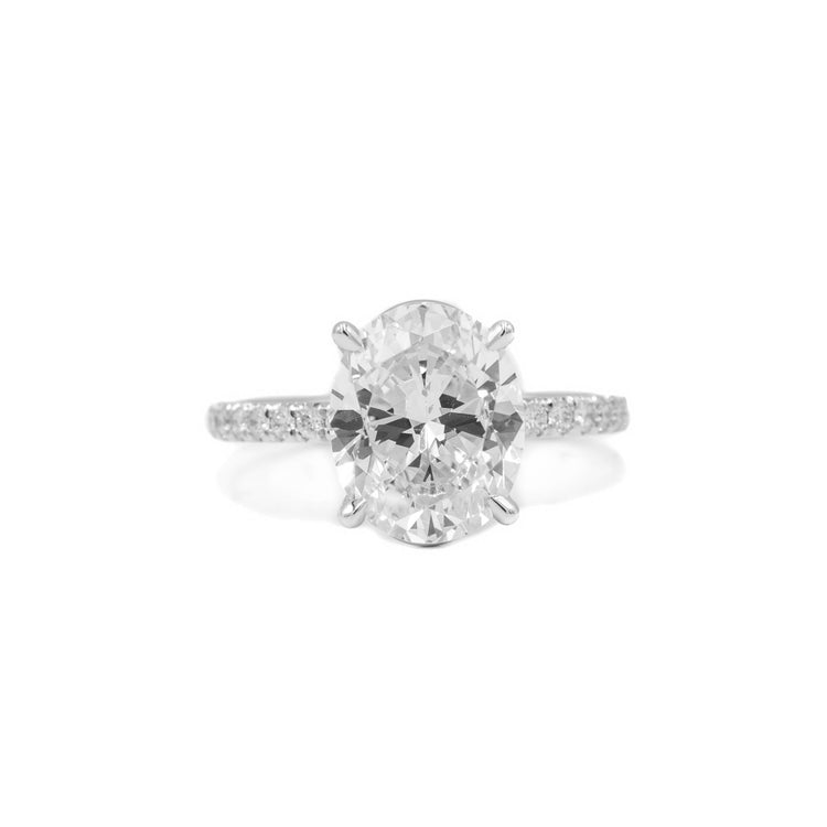 Platinum Oval-Cut French-Set Diamond Ring