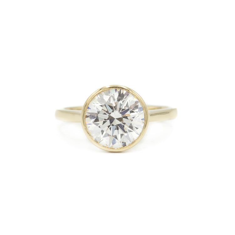 14ky Round Bezel Cathedral Diamond Ring