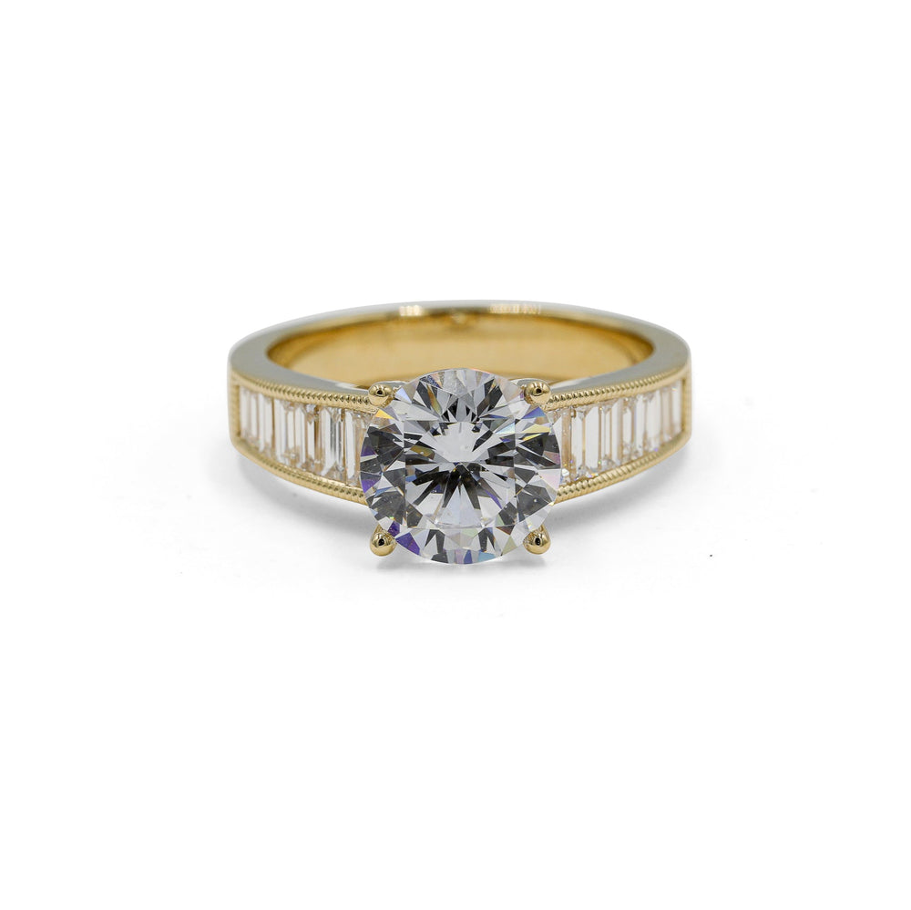 14ky .69ctw Round & Graduated Baguette Diamond Ring