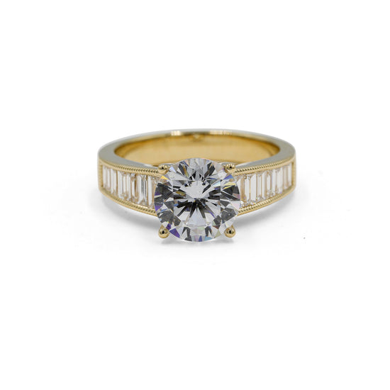 14ky .69ctw Round & Graduated Baguette Diamond Ring