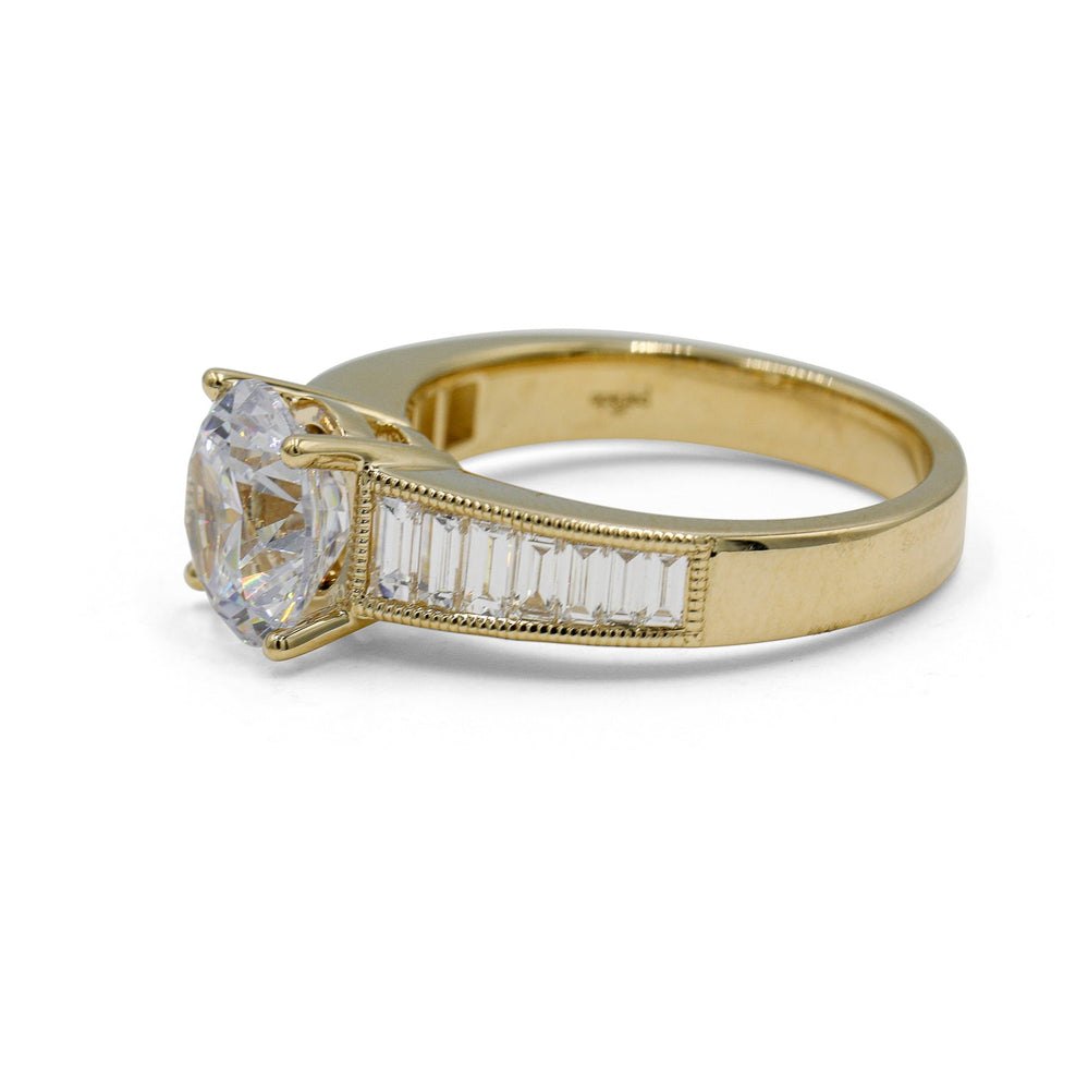 14ky .69ctw Round & Graduated Baguette Diamond Ring