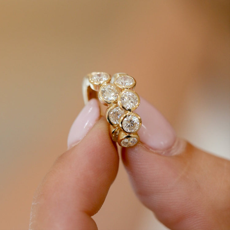 14ky 1.50ctw 4 Round Bezel Huggies