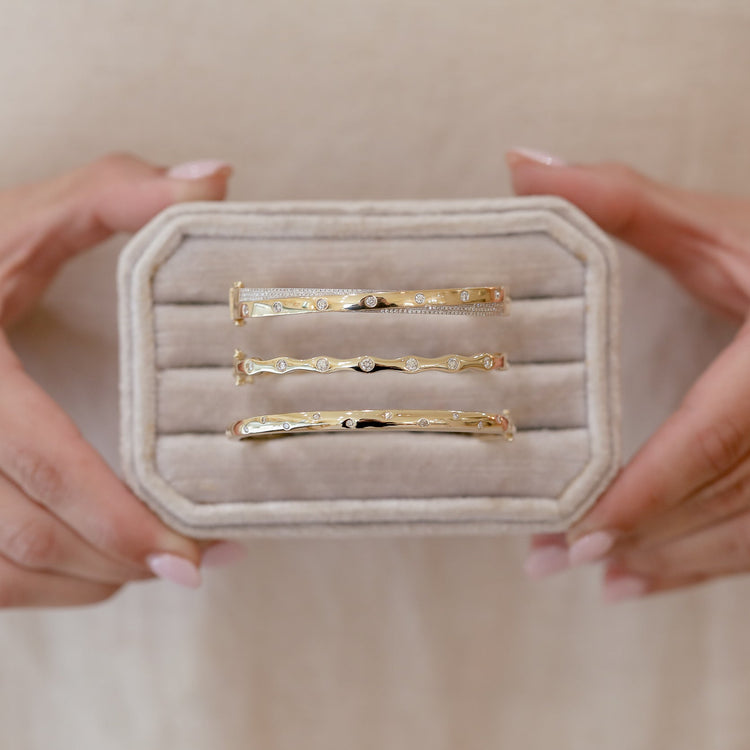 14ky .45ctw Wavy Flush Set Bangle