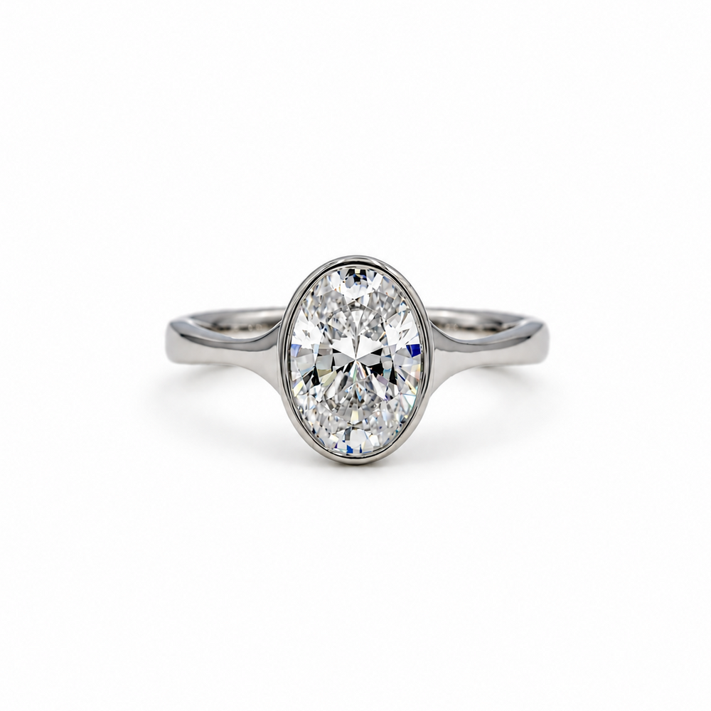 Platinum Oval-Cut Bezel Tapered Cathedral Diamond Ring