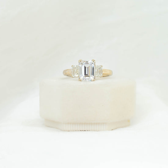 18ky 3-Stone Emerald-Cut Butter-Cup Diamond Ring