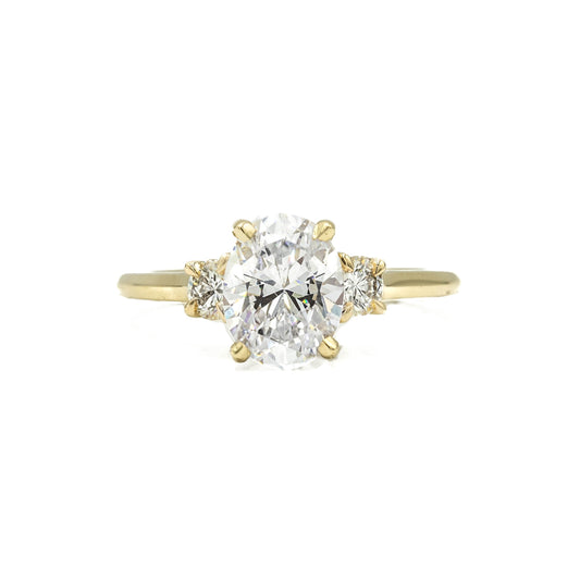 14ky 3-Stone Oval With .30ctw Round-Cut Diamond Ring