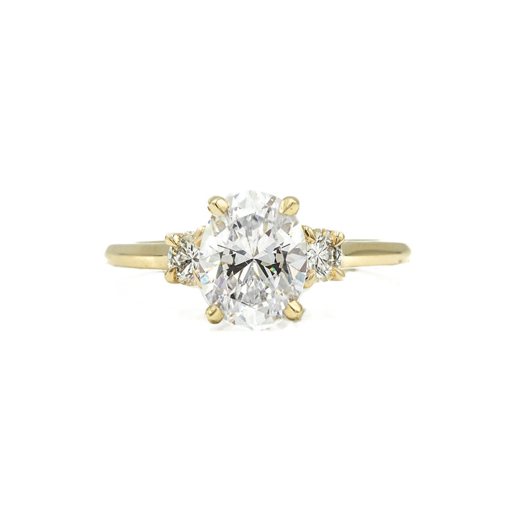 14ky 3-Stone Oval With .30ctw Round-Cut Diamond Ring