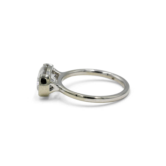 14kw East-West Oval Half Bezel Diamond Solitaire Ring