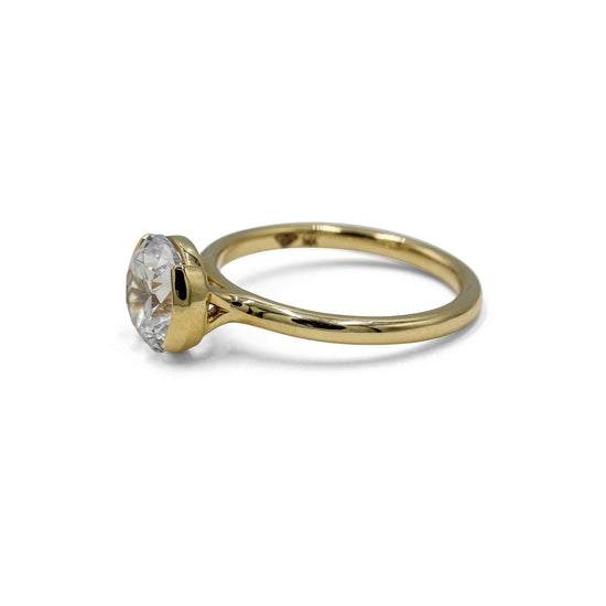 14ky East-West Round Half Bezel Solitaire Diamond Ring