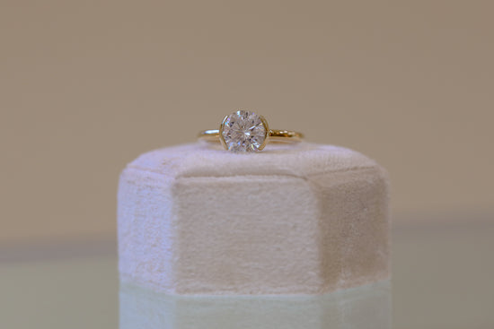 14ky East-West Round Half Bezel Solitaire Diamond Ring