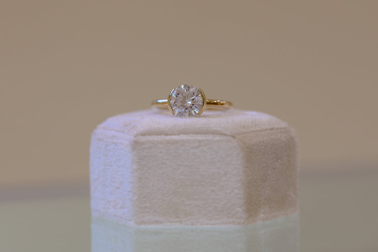 14ky East-West Round Half Bezel Solitaire Diamond Ring