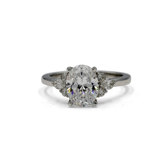 14kw Oval & .33ctw Baguette 3-Stone Lab Diamond Ring