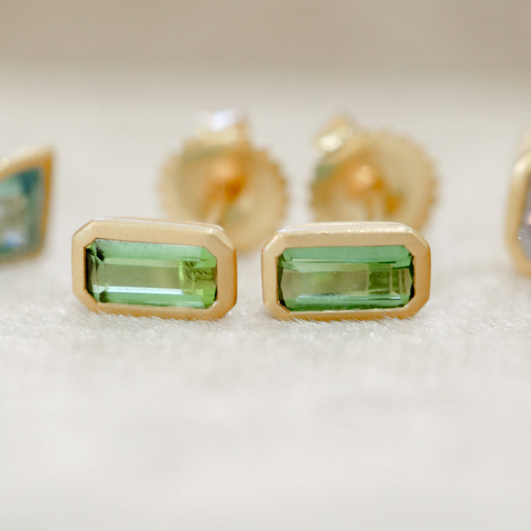 18ky .96ctw Green Tourmaline Emerald Cut Bezel Earrings