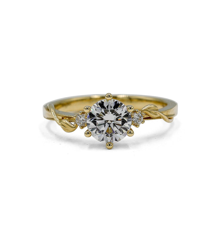 14ky .06ctw Single Leaf Twist Diamond Ring