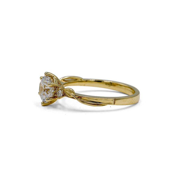 14ky .06ctw Single Leaf Twist Diamond Ring