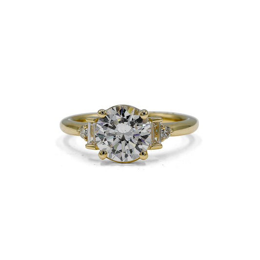 14ky Round & Baguette 5-Stone Cathedral Diamond Ring