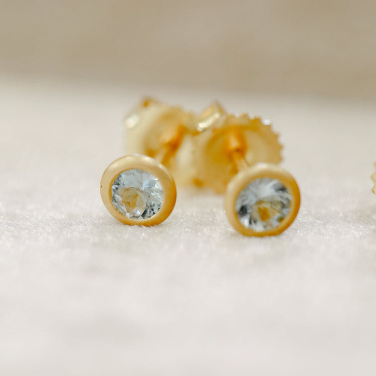 18ky .42ctw Aqua Marine Bezel Earrings