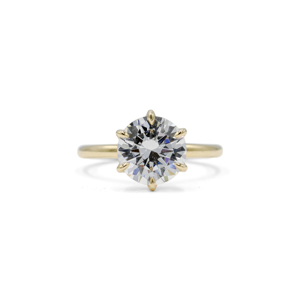 14ky 6-Prong Petal Solitaire Diamond Ring