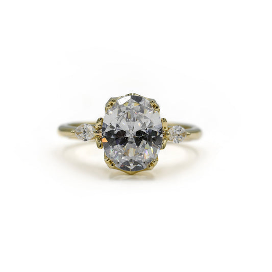 14ky .24ctw Oval-Cut Three-Stone Diamond Rings
