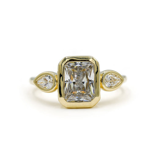 14ky Three Stone Bezel Radiant & .41ctw Pear-Shaped Lab Diamond Ring