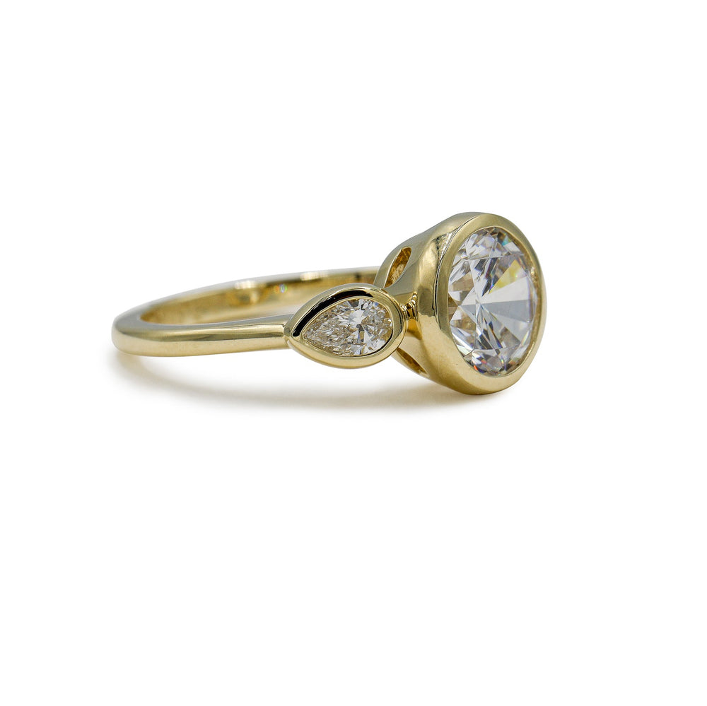 14ky Three Stone Bezel Round & .41ctw Pear-Shaped Lab Diamond Ring