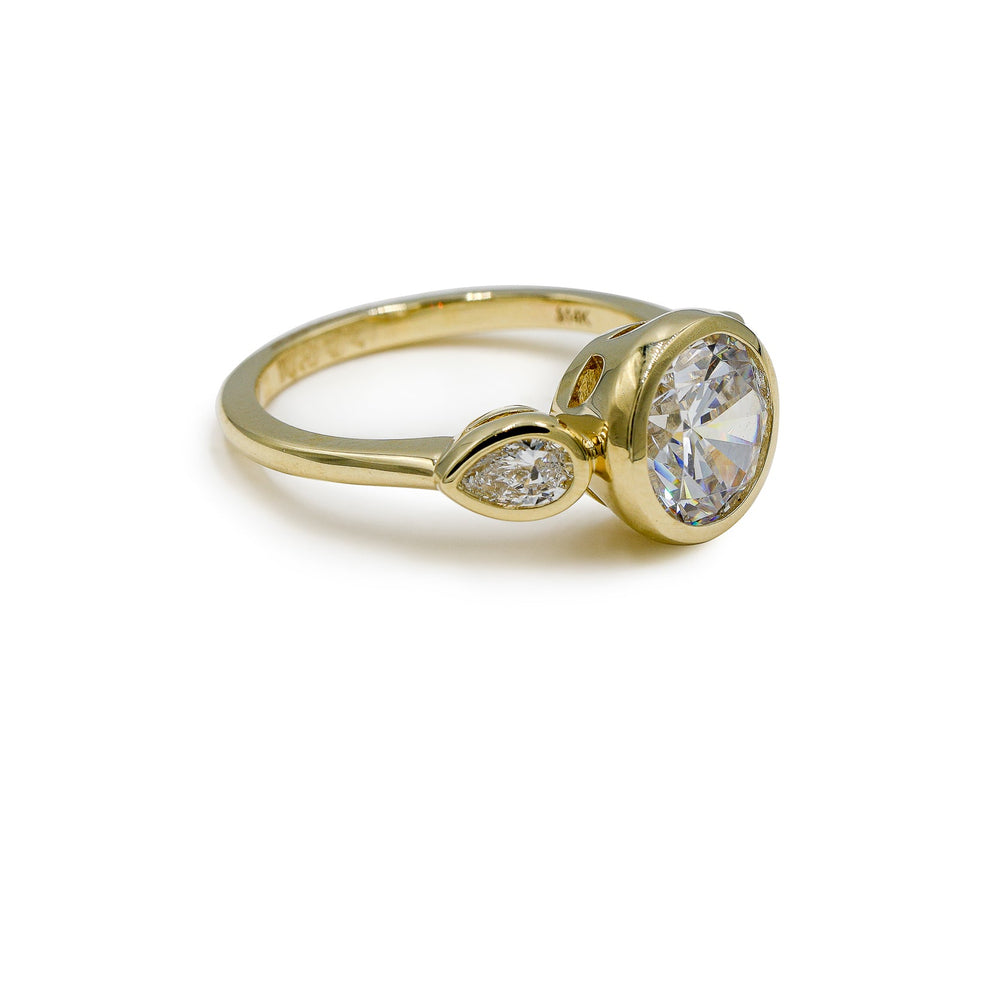 14ky Three Stone Bezel Round & .41ctw Pear-Shaped Lab Diamond Ring