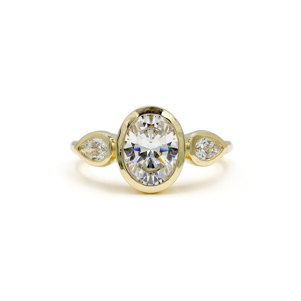 14ky Three Stone Bezel Oval & .41ctw Pear-Shaped Lab Diamond Ring