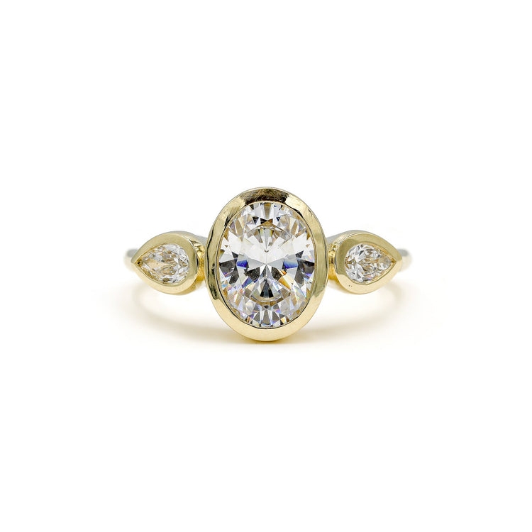 14ky Three Stone Bezel Oval & .41ctw Pear-Shaped Lab Diamond Ring
