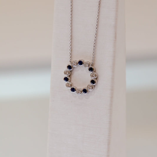 14kw .64ctw Sapphire and .74ctw Diamond Bezel Circle Necklace