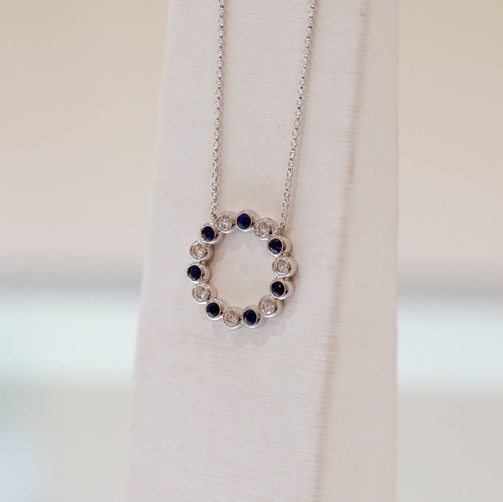 14kw .64ctw Sapphire and .74ctw Diamond Bezel Circle Necklace