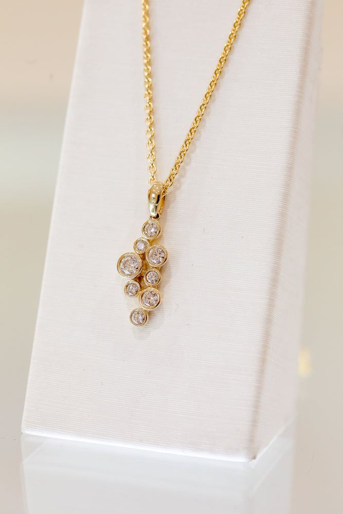 14ky .51ctw Multi Diamond Bezel Pendant