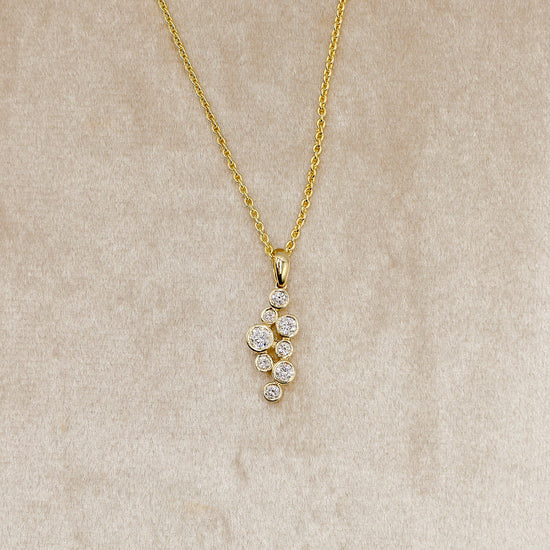 14ky .51ctw Multi Diamond Bezel Pendant