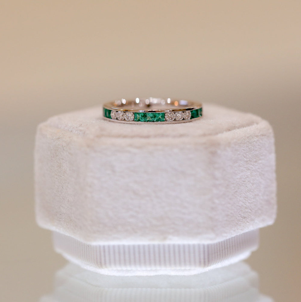 14kw Alternating .38ctw Emerald and .23ctw Diamond Channel Band