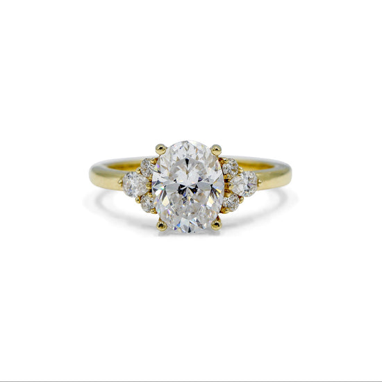 14ky Oval with .19ctw Pear and .11ctw Round Accent Ring