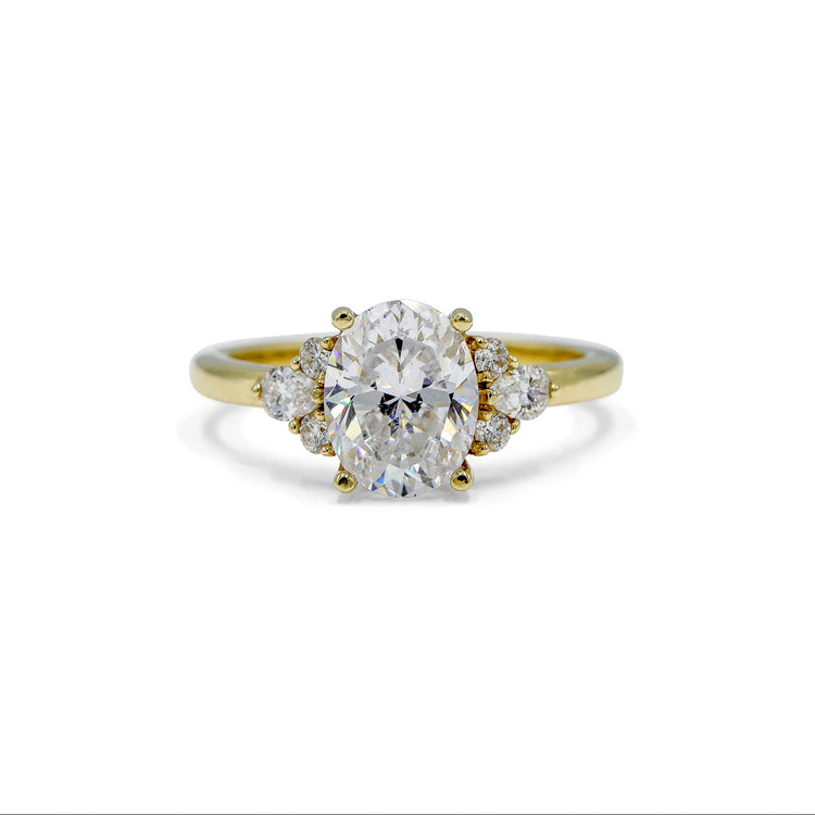 14ky Oval with .19ctw Pear and .11ctw Round Accent Ring