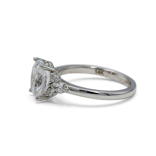 14kw Oval with .19ctw Pear and .11ctw Round Accent Ring