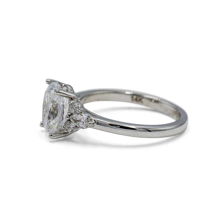 14kw Oval with .19ctw Pear and .11ctw Round Accent Ring