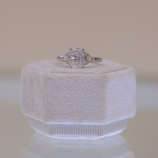 14kw Oval with .19ctw Pear and .11ctw Round Accent Ring