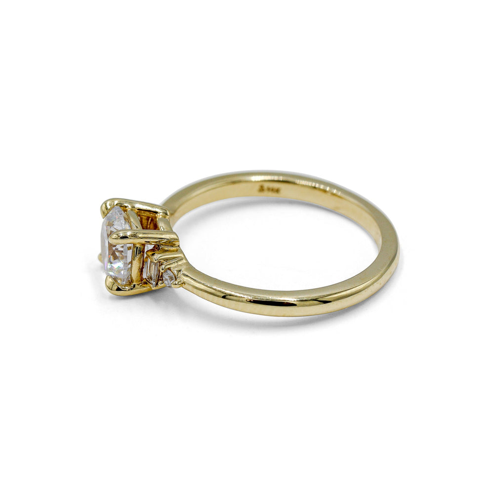 14ky .07ctw Low Profile Baguette & Round Diamond Ring