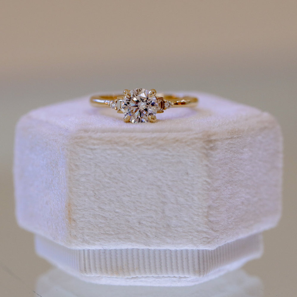 14ky .07ctw Low Profile Baguette & Round Diamond Ring