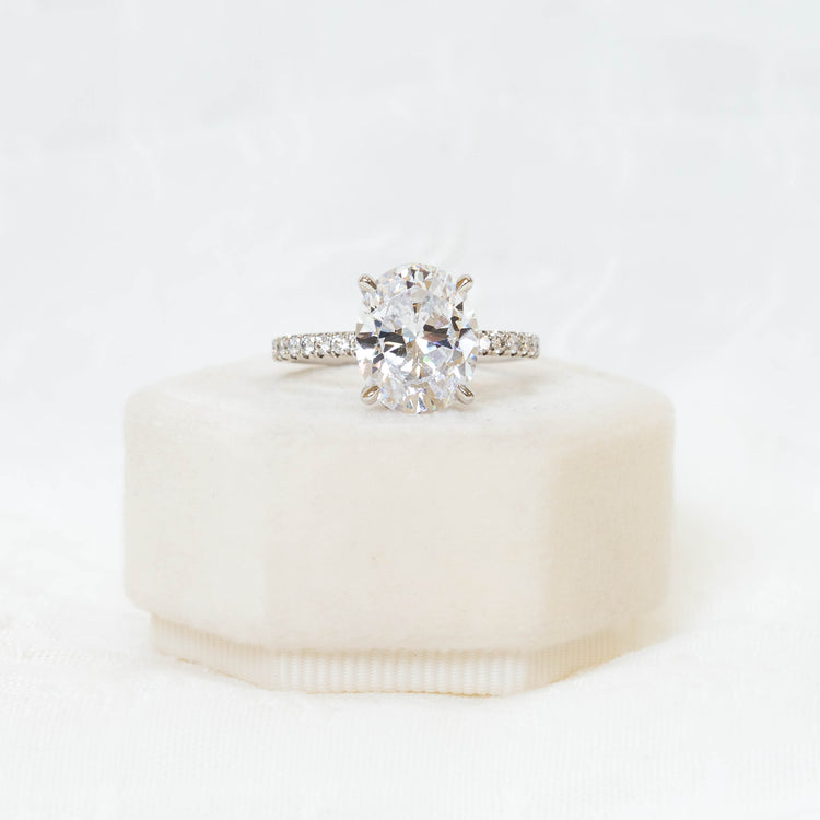 Platinum Oval-Cut French-Set Diamond Ring